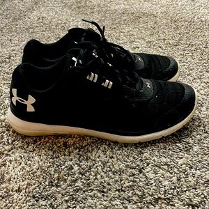 Black Under Armour Athletic Shoes with white trim.  Size 9.5